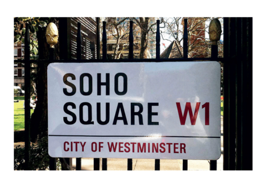 Street sign saying Soho Square